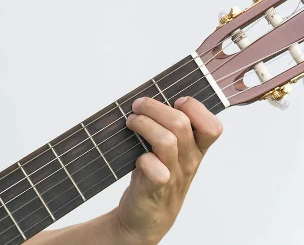 Mão tocando na guitarra — Fotografia de Stock