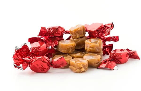 Caramel candy on white — Stock Photo, Image