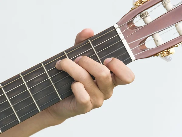 Mão tocando na guitarra — Fotografia de Stock