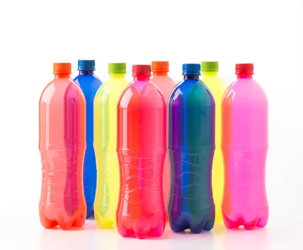 Bottles of soft drinks on white background — Stock Photo, Image