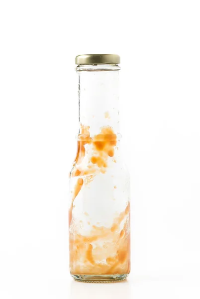 Botella de salsa sobre fondo blanco — Foto de Stock