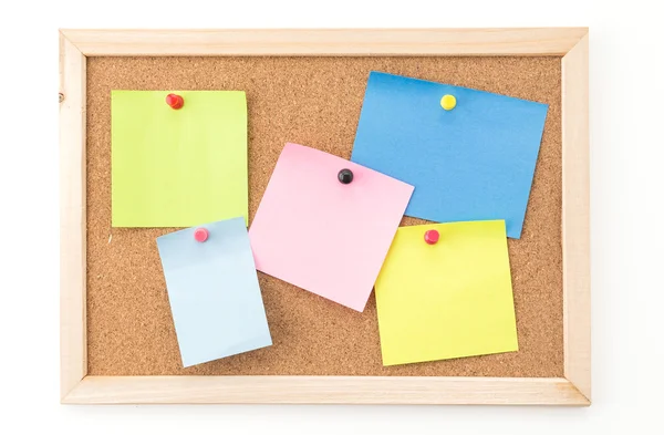 Sticky note on cork board Royalty Free Stock Photos