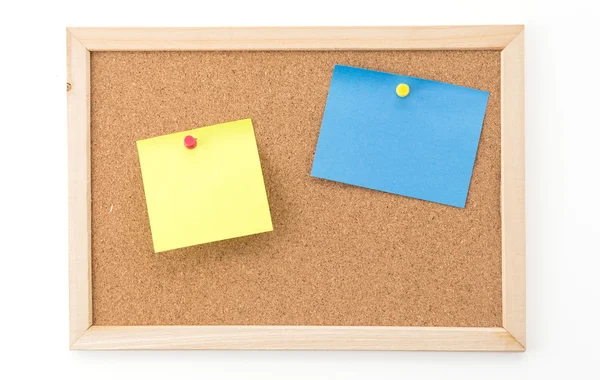 Sticky note on cork board Stock Image