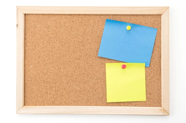 Sticky note on cork board Royalty Free Stock Images