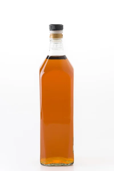 Wisky Flasche auf weißem Hintergrund Stockbild