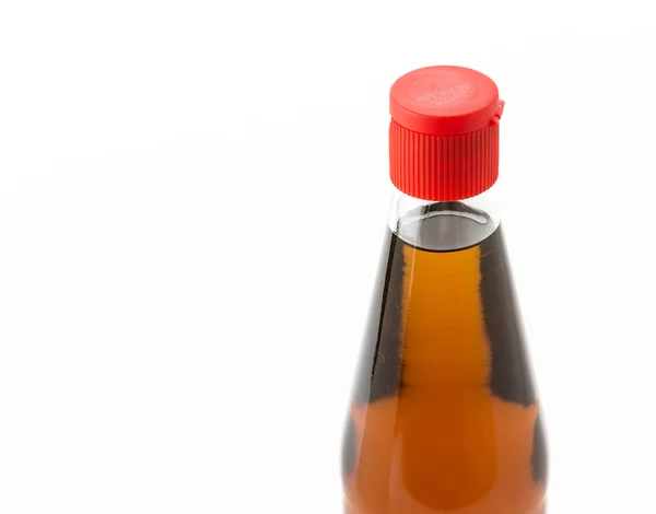 Бутылка кунжутного масла — стоковое фото