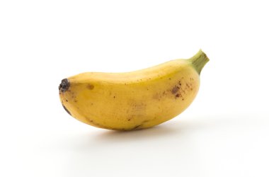 beyaz zemin üzerine altın muz