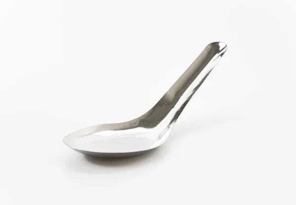 Short spoon on white background — Stock Photo, Image