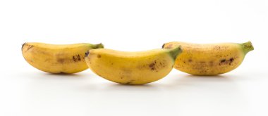 beyaz zemin üzerine altın muz