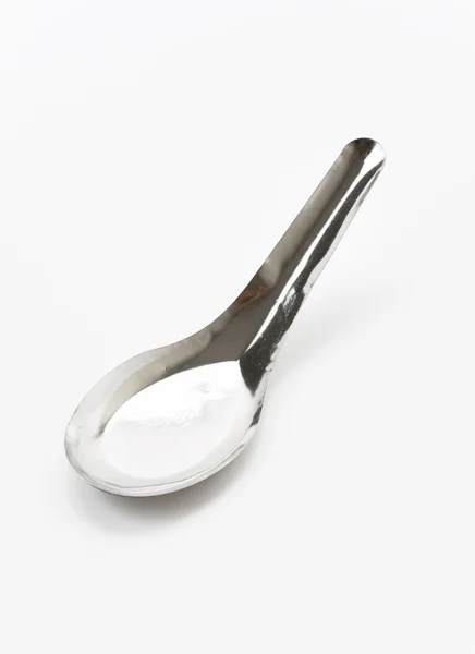 Short spoon on white background — Stock Photo, Image