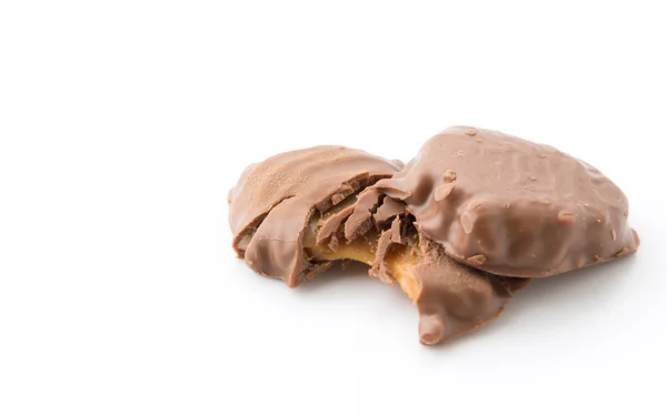 Caramelo de chocolate no fundo branco — Fotografia de Stock