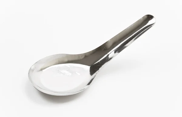 Short spoon on white background — Stock Photo, Image