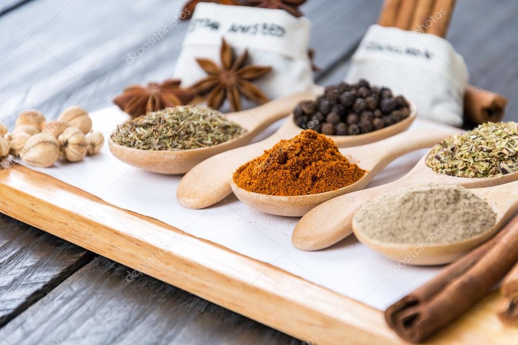 Spices and herbs in  bowls.  