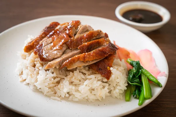 Barbecue roasted duck on rice