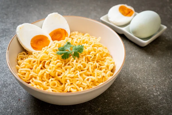 instant noodles bowl with salt egg