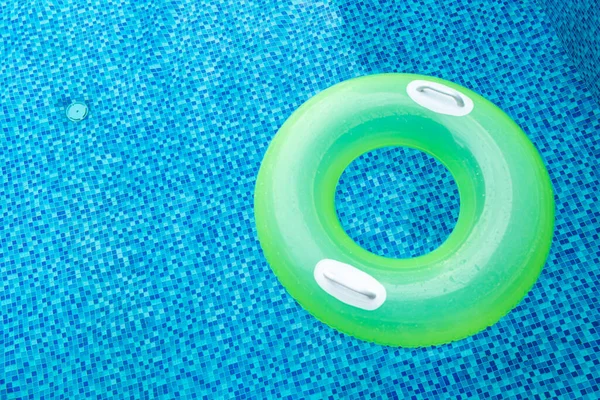 swim ring in blue swimming pool