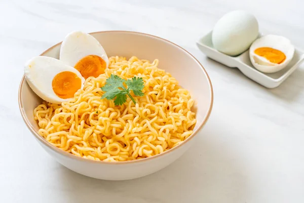 instant noodles bowl with salt egg