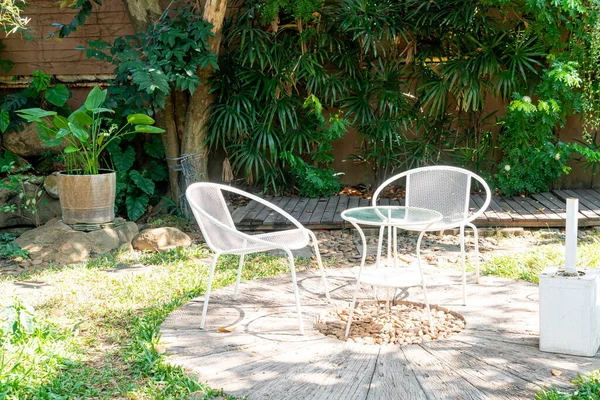 empty white chair in the garden