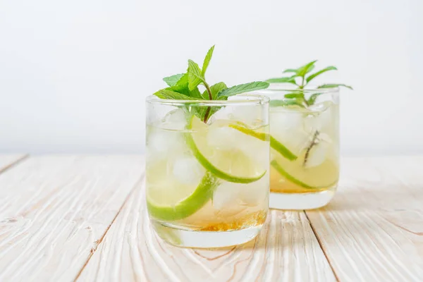 iced honey and lime soda with mint - refreshing drink