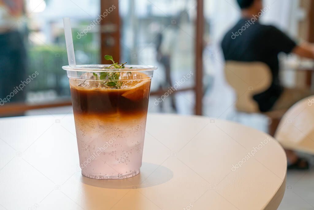 espresso coffee tonic with yuzu orange in cafe restaurant