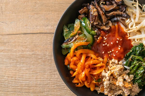 stock image Bibimbap, Korean spicy salad with rice bowl - traditionally Korean food style