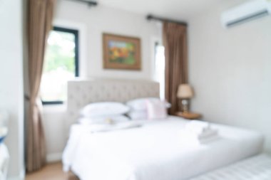 Özet olarak arkaplan için bulanık ve odaklanmış yatak odası