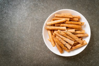 Çıtır hindistan cevizli rulo ekmek. Tayland 'da geleneksel bir tatlı.