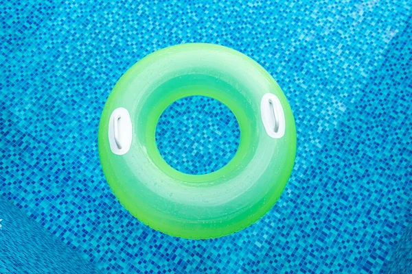swim ring in blue swimming pool