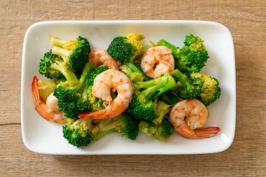 stir-fried broccoli with shrimps - homemade food style clipart