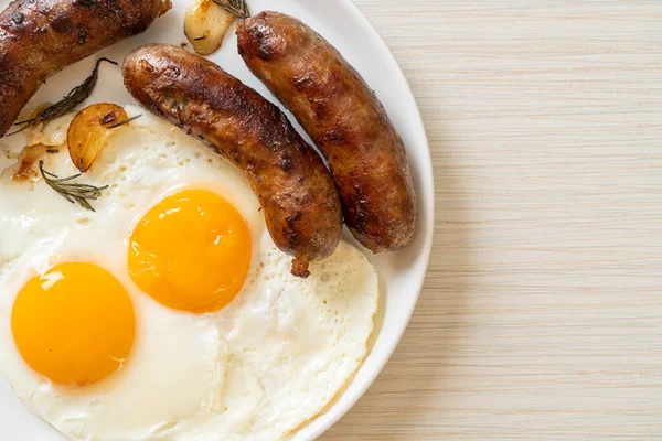 Homemade Double Fried Egg Fried Pork Sausage Breakfast — Stock Photo, Image