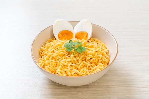 instant noodles bowl with salt egg