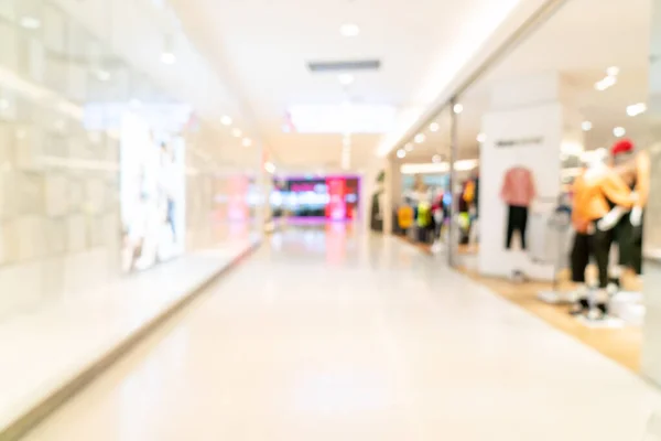 abstract blur shop and retail store in shopping mall for background