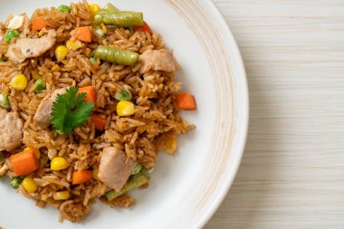 Domuz eti ve sebzeli pilav.