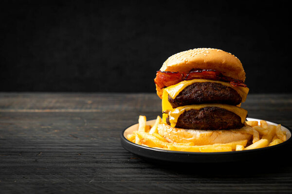 hamburger or beef burgers with cheese and bacon - unhealthy food style