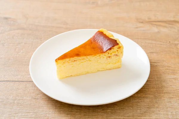 Homemade Burn Cheesecake White Plate — Stock Photo, Image