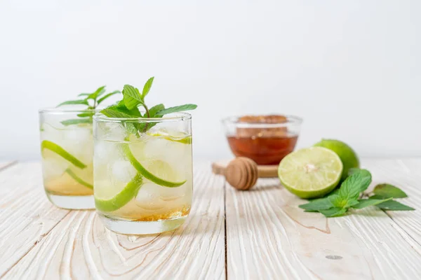 iced honey and lime soda with mint - refreshing drink