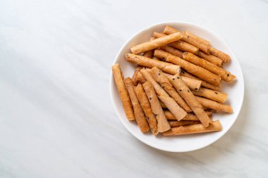 Çıtır hindistan cevizli rulo ekmek. Tayland 'da geleneksel bir tatlı.