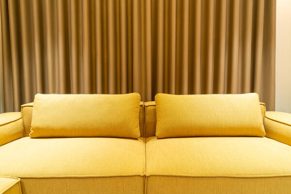 empty golden mustard sofa in living room