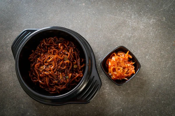 Korean black spaghetti or instant noodle with roasted chajung soybean sauce (chapagetti) - Korean food style