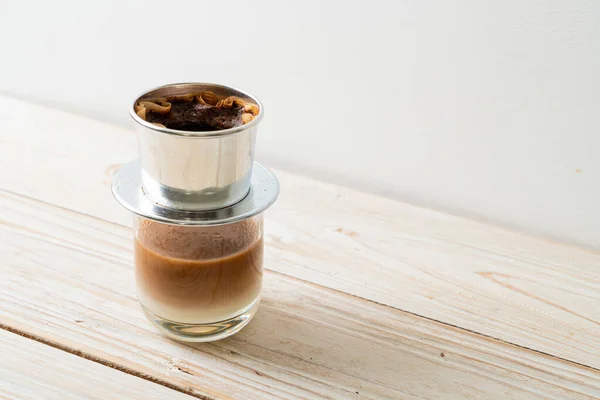 stock image Hot milk coffee dripping in Vietnam style - Saigon or Vietnamese coffee