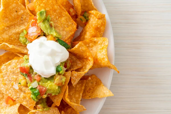 Mexican Nachos Tortilla Chips Jalapeno Guacamole Tomatoes Salsa Dip — Stock Photo, Image