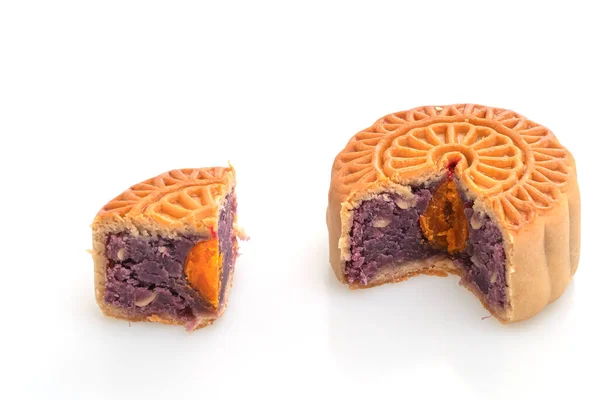 Chinese moon cake purple sweet potato and egg yolk flavour isolated on white background