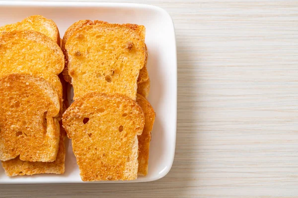 Gebakken Knapperig Brood Met Boter Suiker Bord — Stockfoto