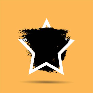 Turuncu bir zemin üzerine beyaz çizgili çarpıcı bir siyah yıldız canlı bir kontrast oluşturur..