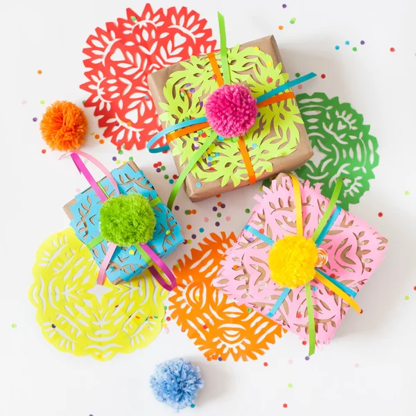 Preparation for the holiday. Gifts wrapped in colorful paper. — Stock Photo, Image