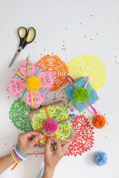 Preparation for the holiday. Gifts wrapped in colorful paper. — Stock Photo, Image