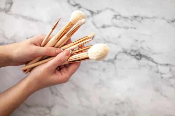 Female Hands Holding Group Makeup Brushes Powder Eyeshadow Isolated Coral — Stock Photo, Image