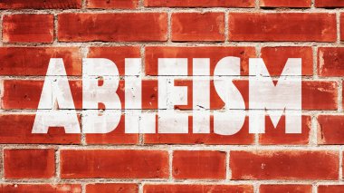 Bir tuğla duvara yazılmış ableism