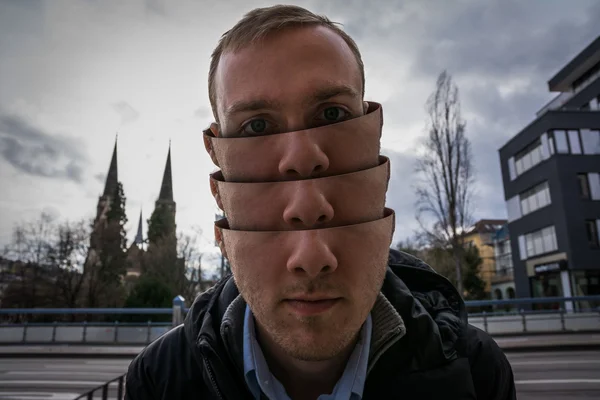 Halmozott fej manipuláció portré Stuttgart fiatalember — Stock Fotó