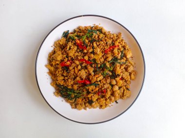 Tumis Oncom Kemangi. Popüler bir Sundan vejetaryen yemeği sotelenmiş ve fesleğen yaprakları. Geleneksel ev yapımı gıda konsepti